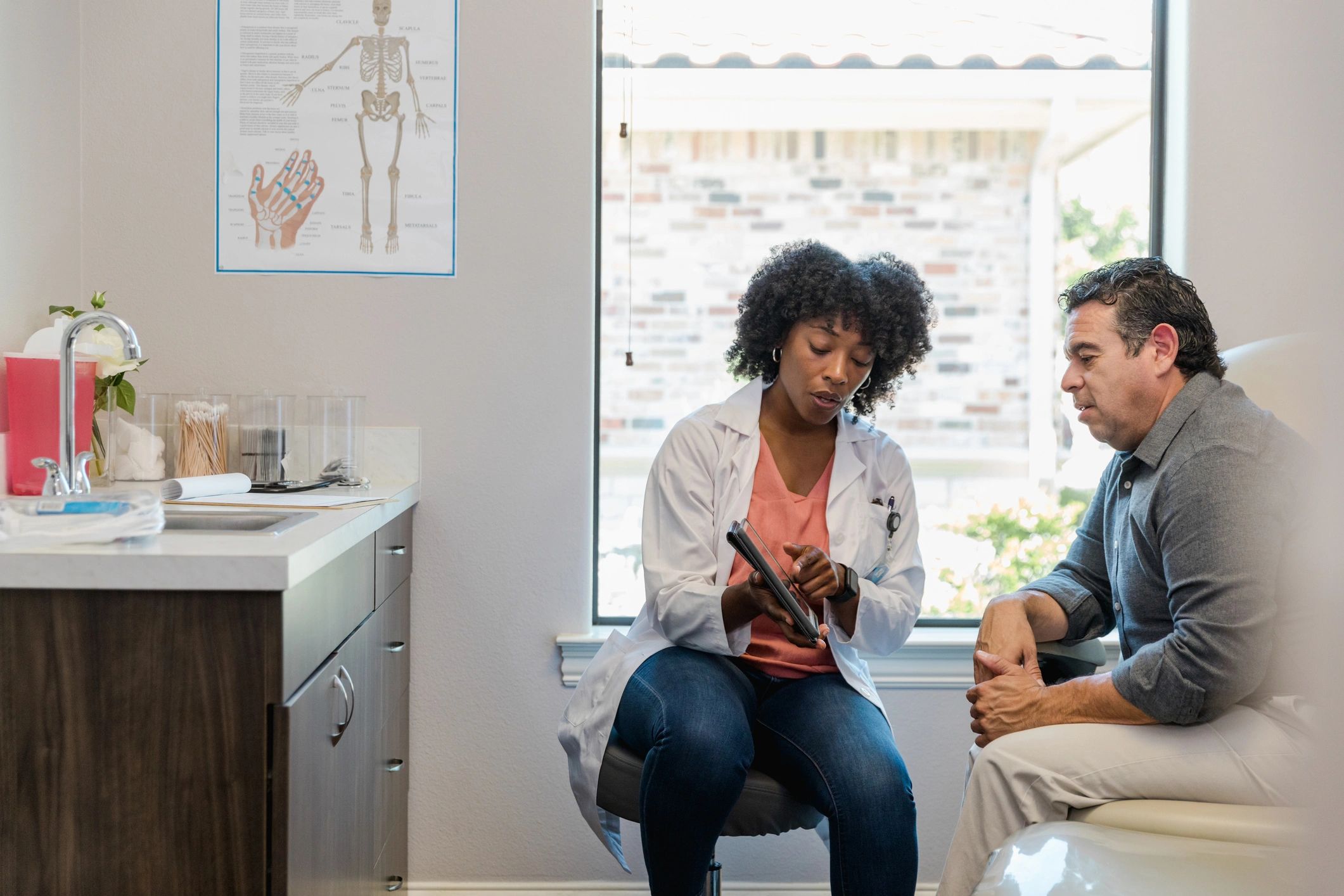 Consultant reviewing plans with a healthcare client