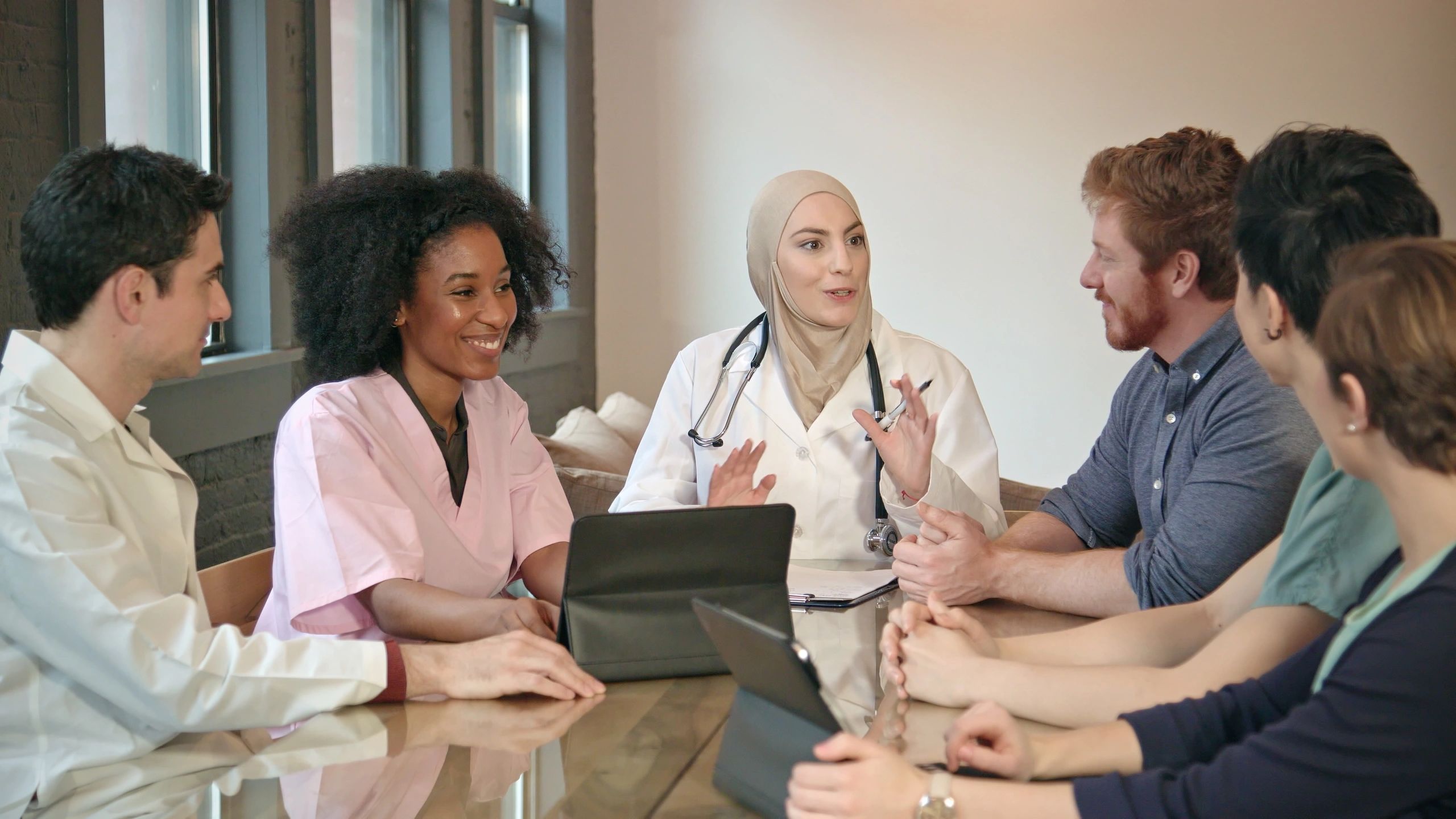 Healthcare professionals meeting to plan a new practice